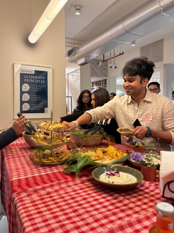Guests gathered around the grazing table