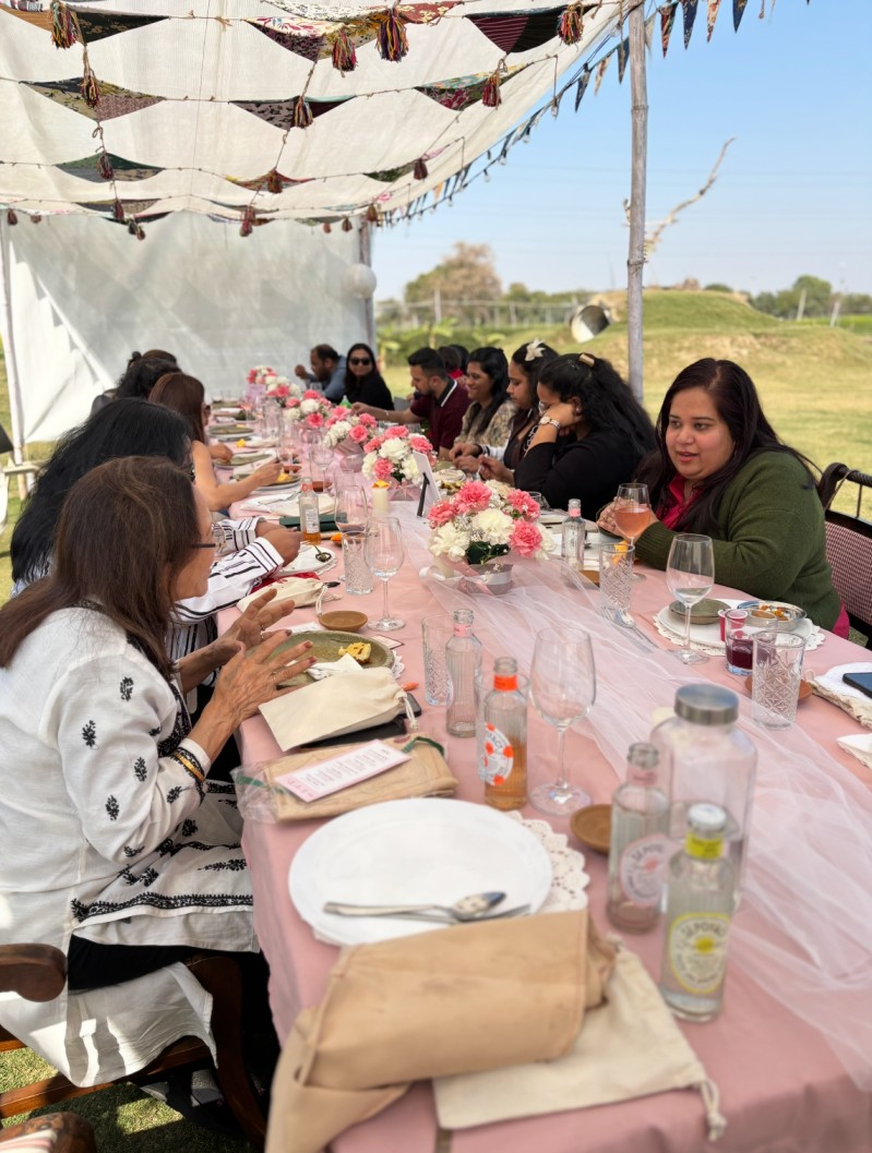 Guests around the table at a Toontooni's Table supper club
